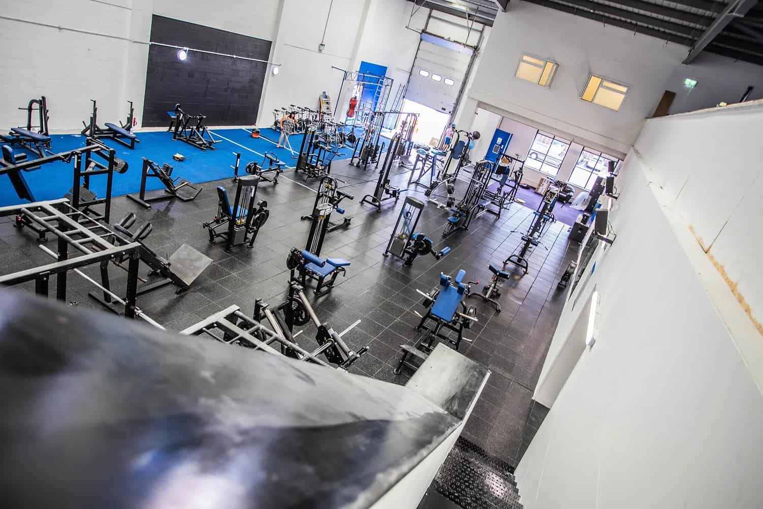 All-Inc Fitness gym floor in London with members training on modern equipment