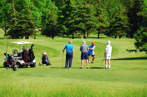 A group of men playing golf together regularly at a local club by using monthly memberships that ensure exclusive perks.